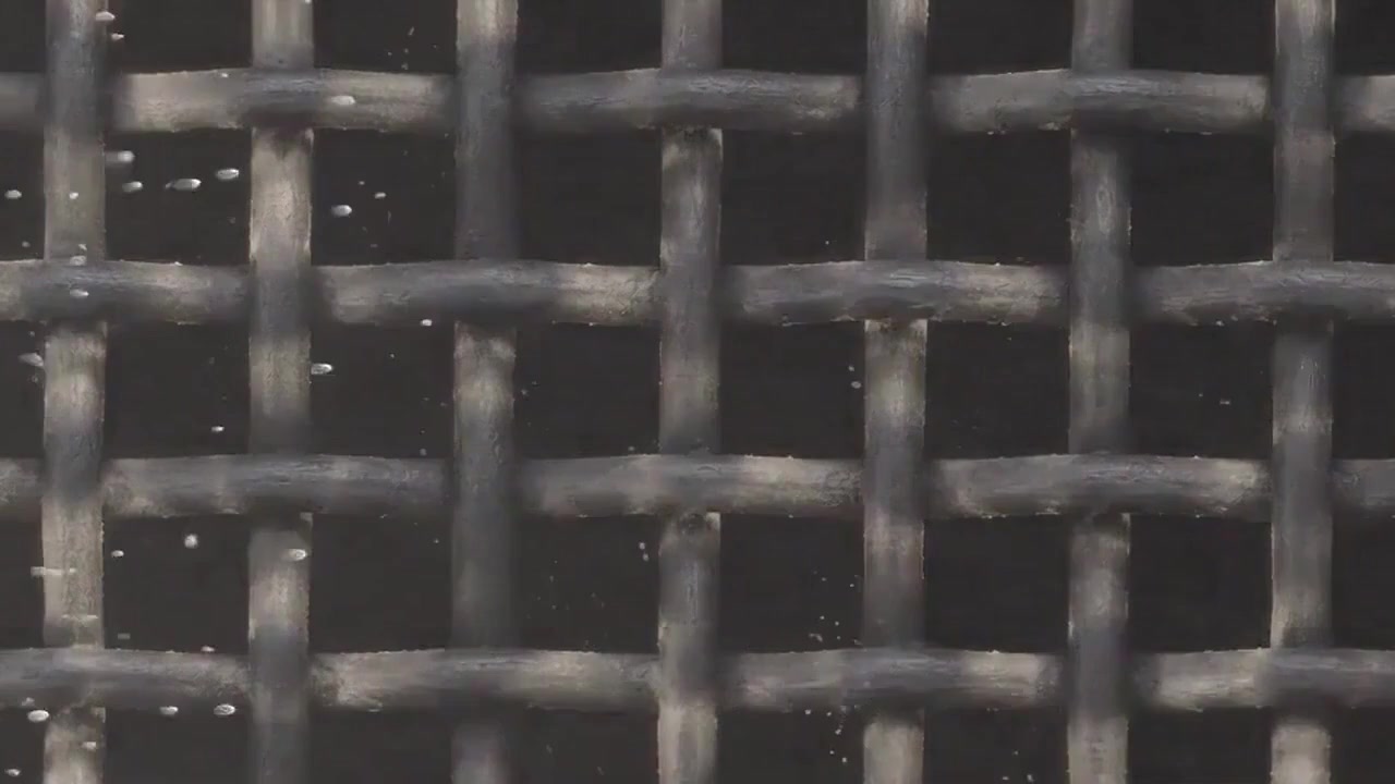 Close view of dusty buildup on screen mesh